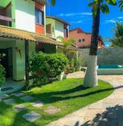 Casa com piscina 2km do centro em condomínio, paz e descanso