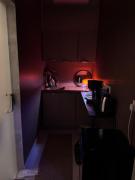 Elegant studio with 65-inch screen and outdoor seating