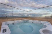 NEW - Only Suites Unit 2, Modern 2-Bedroom apartment with common heated Jacuzzi by SF Homes