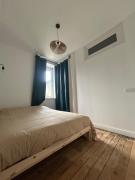 Aux chants des vagues, Vue Falaises, Idéal Famille