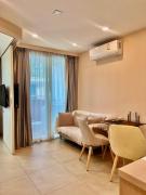 Olympus condo balcony and washing machine