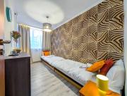 Powstańców Śląskich Homely Apartment by BookingHost