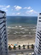 Apartamento frente o mar com piscina para família