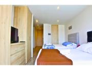 Oasis in Zona T with 2 Queen Beds, Pool, Sauna & Gym