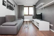 White and Grey Apartment in Cracow with Parking by Noclegi Renters