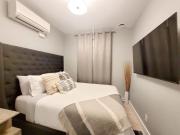 Elegant 2-Bedroom Stay with Massage Chair & Chic Interiors