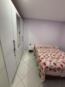 Casa aconchegante a poucos passos da praia!