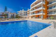 Bright 2BR with Pool near Beach by LovelyStay
