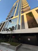 Apartamento moderno, a 200 metros da praia com pátio,piscina e churrasqueira privativa 2 vagas de garagem