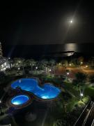 Primera línea, playa, piscina y amanecer