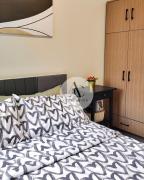 Cozy staycation 1BR with WiFi, Netflix and more at Shore 3 MOA