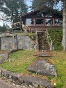 Exclusive Private 20 Acre Round Lake Waterfront Estate Hayward WI 6 Bedroom Ranch Style Lodge Private Boat Docks Fire-Pit Sunrise to Sunset Views Swim Beach Situated on 2000ft Sandy Lakeshore