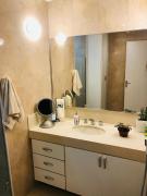 Quarto acolhedor em Copacabana com duas camas de solteiro