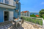 Helles Apartment nur 300 Meter zum Strand mit Meerblick, Grillplatz, Waschmaschine