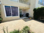 Apartment with a private backyard