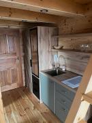 Zrub Kriváň Drevená chata s výhľadom na Tatry