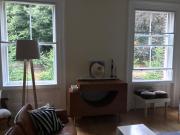 Luxurious tranquil large bedroom suite in interior designed Georgian Townhouse