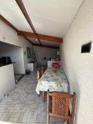 Casa no Pereque açu com churrasqueira e wi-fi