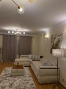 Elegant Escape Luxury Apartment In Rehab City