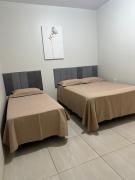 Quarto com ar banheiro frigobar