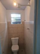 Kitnet simples com banheiro privativo e ar condicionado