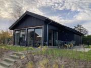 4-person chalet La Cabana by the water with parking space