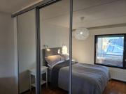 Stylish two-bedroom apartment with balcony & great views