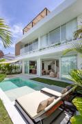 Luxury 3 bed beachside villa with cold plunge pool, rooftop & designer furniture