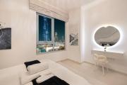 Large 4 Bed Apt with Burj View and 8 Min Walk to Mall by Vista Stays DXB