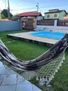 Casa ampla e agradável com piscina para descanso