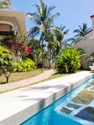 Beachfront Palm Haven