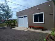 Casa em Tramandaí - 2 quadras da praia - Com ar condicionado e churrasqueira