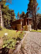 LOS HUEMULES - casa nueva en medio del bosque y a pasos del centro de la ciudad-