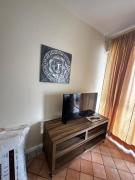 C112 Apartamento de 1 quarto pé na areia com vista lateral ao mar em Canasvieiras