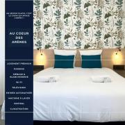 Au Cœur des Arènes - Parking - Wifi - Clim