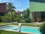 Casas aconchegantes com piscina na encantadora Praia das Cigarras