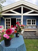 Houten familiehuisje Noordwijk met grote tuin