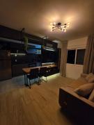 Complete and spacious apartment with garage and swimming pool