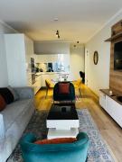 Ellipse Waterfall 2BR with Pool, Restaurant & Gym