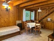 A centrally located cabin surrounded by nature