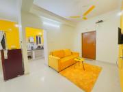 Yellow Delight 2BHK Themed flat near US Consulate