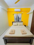 Yellow Delight 2BHK Themed flat near US Consulate