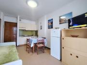 Sunny apartment right by the beach