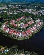 Apartamento confortável em uma vila de observadores de pássaros com vista para a lagoa!