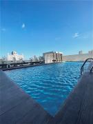 Modern Studio at The Median - Hi speed WIFI, Netflix & Prime, Near IT Park