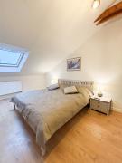 Attic Apartment, center of Košice with private parking