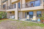 Beachfront condo with outdoor pool, patio & washerdryer - dog-friendly