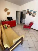 Casa pé na areia em Marataizes na cidade nova