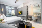 Vogue Vacation Homes, Downtown Mag 318 near Burj Khalifa and Dubai Mall, Studio Apartment with Balcony and City View, Access toAmenities