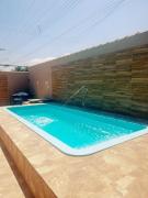 Casa com piscina centro de Bertioga